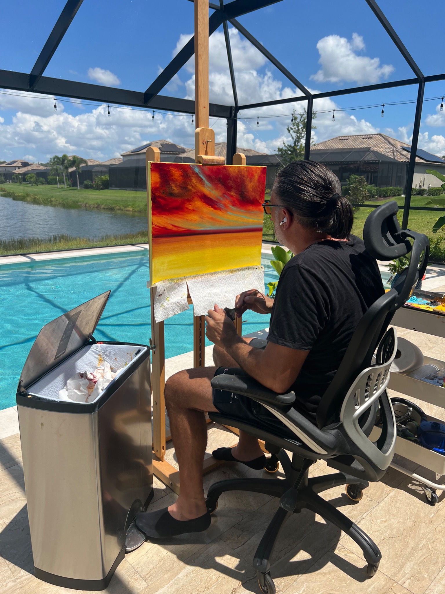 Mark A. Bradford painting outdoors at the easel